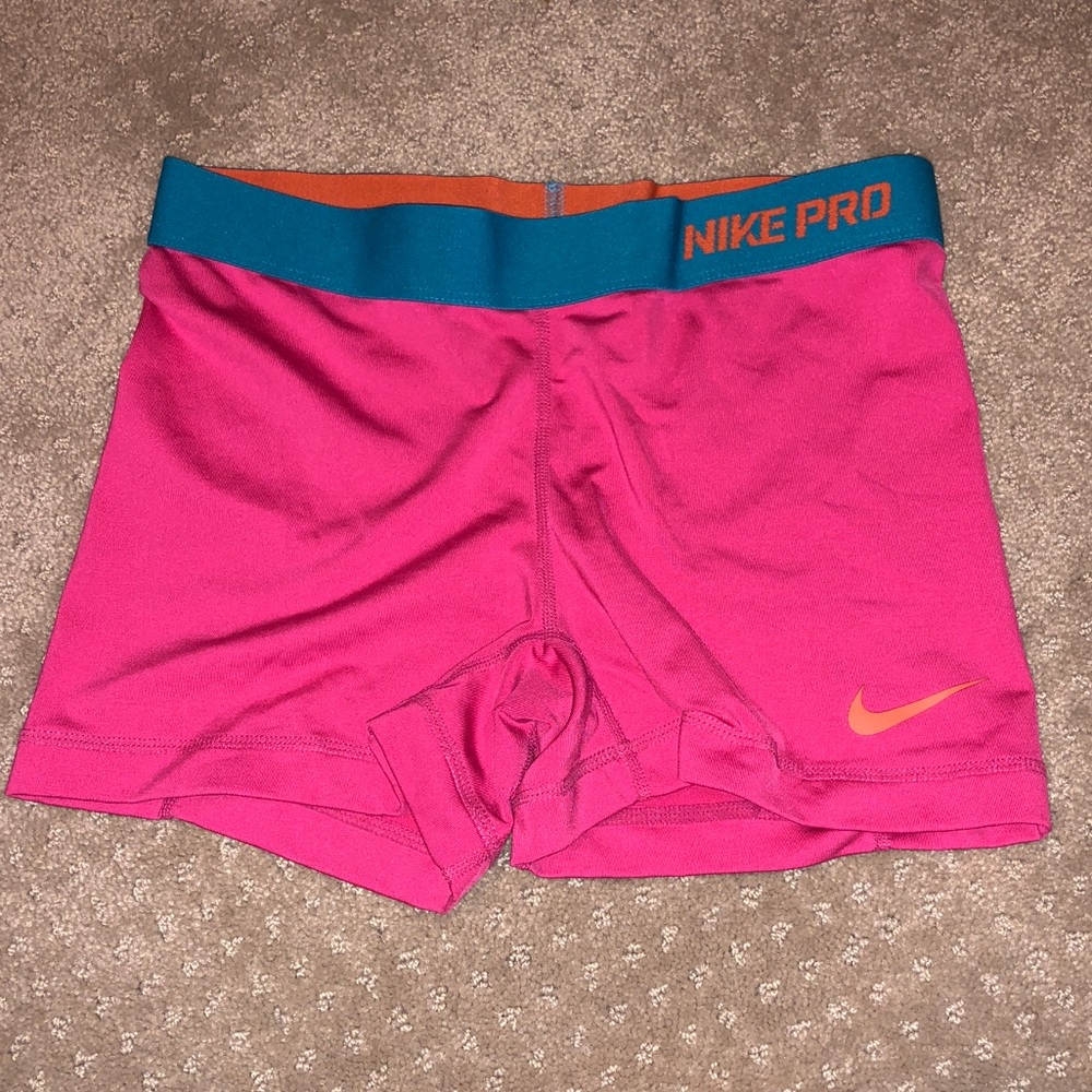 Nike Pro fitted  work out shorts in pink